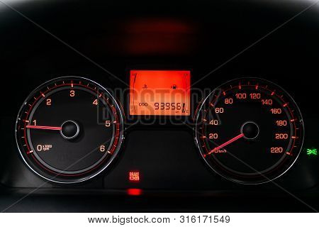 Novosibirsk, Russia - July 30, 2019:  Actyon Ssangyong, Car Dashboard With Red  Backlight: Odometer,