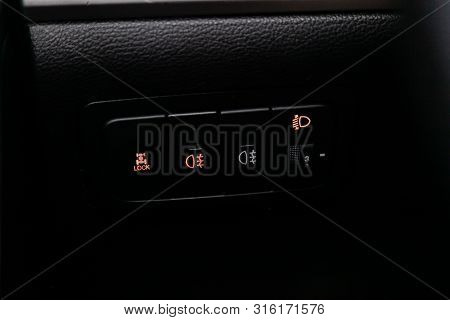Novosibirsk, Russia - July 30, 2019:  Actyon Ssangyong, Close-up On The Headlight Switch Control But