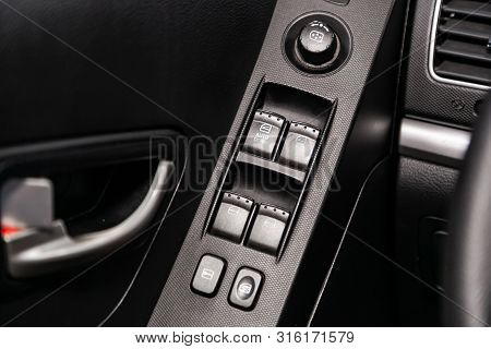 Novosibirsk, Russia - July 30, 2019:  Actyon Ssangyong, Close-up Of The Side Door Buttons: Window Ad