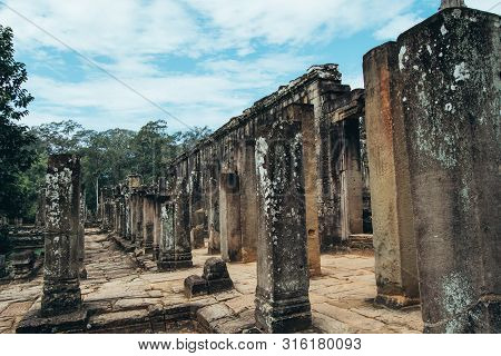 Careless Ruins Of Ankgor Thom In Cambodia On A Summer's Day