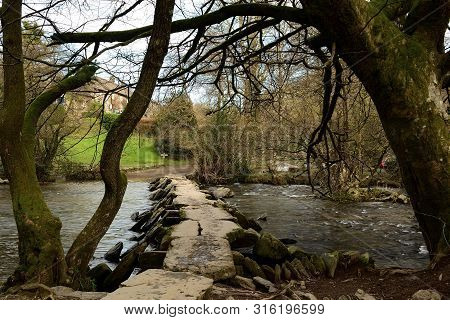 View Of The Clapper Bridge At Tarr Steps In Devon