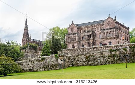 Comillas,spain - May 17,2019 - View At The Sobrellano Palace With Pantheon In Comillas. Comillas Is 