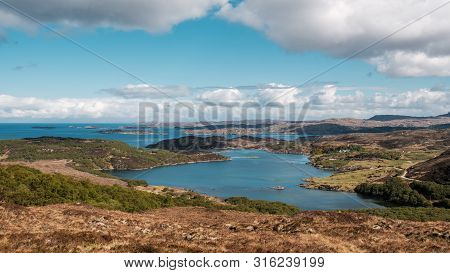 View Over Ardvar, Loch Ardbhair And Islands Out To Sea On The North Coast Of Scotland