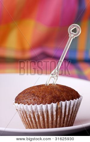One piece of banana cake with a fork background colorful