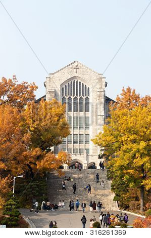 Seoul, South Korea, November 6, 2018, Student And Traveler Walk At Welch -ryang Auditorium During Au