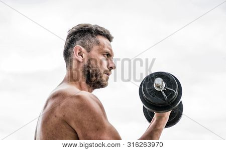 Man Sportsman Weightlifting. Steroids. Fitness And Sport Equipment. Muscular Man Exercising In Morni