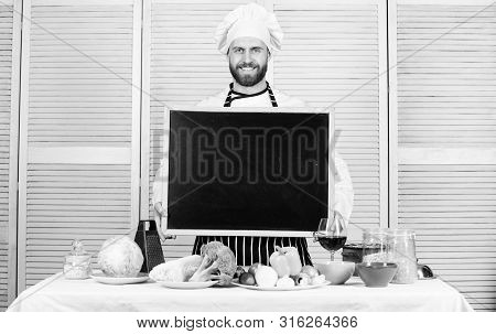 Cooking School Lesson. Master Cook Giving Cooking Class. Chief Cook Teaching Master Class In Cooking
