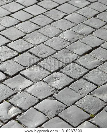 Detail Of Paved Floor Of Saint Peter Square In Vatican City. The Cobblestones Are Called Sampietrini