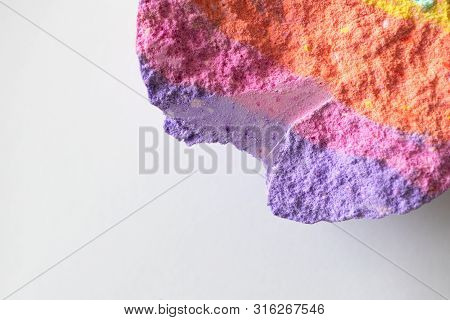 Halves Rainbow Bath Bomb Close-up On White Background