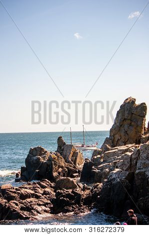 Ships Sailing Off The Bornholm Coast. Rocks