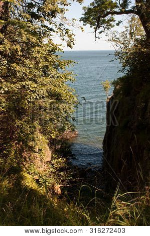 The Rocks Off The Coast Of Bornholm. A Piece Of Rough Nature