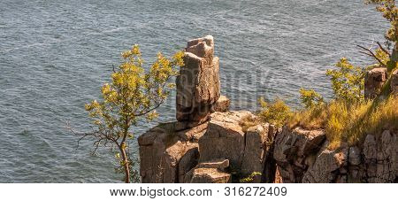 The Rocks Off The Coast Of Bornholm. A Piece Of Rough Nature