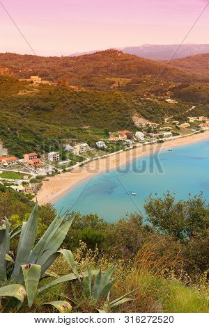 Agios Georgios Town. Pagon Beach In Corfu Island, Greece. Mediterranean Landscape.