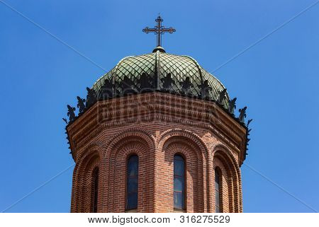 Bucharest, Romania - July 11, 2019: The Cupola With Cross Of The Front Tower Of The Church Of The An