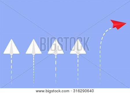Paper Airplane. Four White Planes Flying In One Direction, One Red Plane In The Other. Conceptual Mu