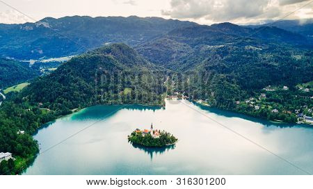 Bled, Slovenia. Aerial Drone View Of Lake Bled With The Pilgrimage Church Of The Assumption Of Maria