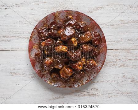 Delicious Organic Sweet Dates In Bowl With Syrup. Iftar Dates.