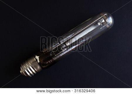 Sodium Lamp On A Black Background Top View Close-up