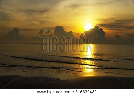 Sunrise In The Sea Beautiful On Beach At Thung Wua Lan Beach, Chumphon Province Thailand
