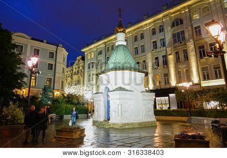 Moscow - July 2019: Orthodox chapel in Stoleshnikov Lane. Night view.