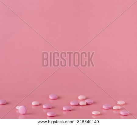 Scattering Of Red And White Drug Capsules