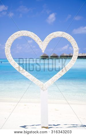 Shape Of A Heart In The Beach In Maldives.