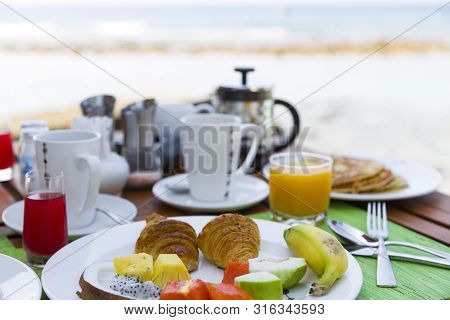 Breakfast Consisting Of Fresh Fruit And Pancakes