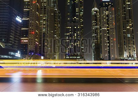 Long Exposure Of Dubai Marina At Night. Beautiful Lights