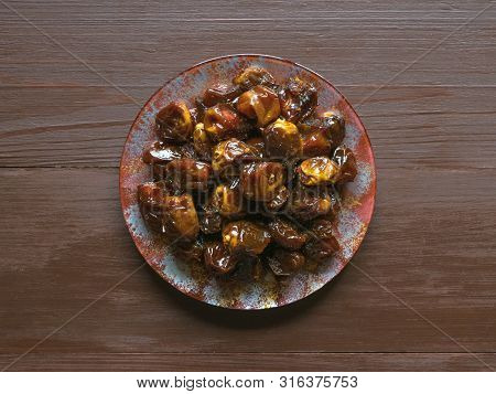Delicious Organic Sweet Dates In Bowl With Syrup. Iftar Dates.