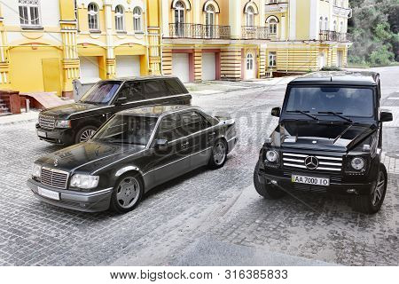 Kiev, Ukraine - September 6, 2013: Mercedes E500 W124 Wolf On The Background Of Beautiful Old Houses