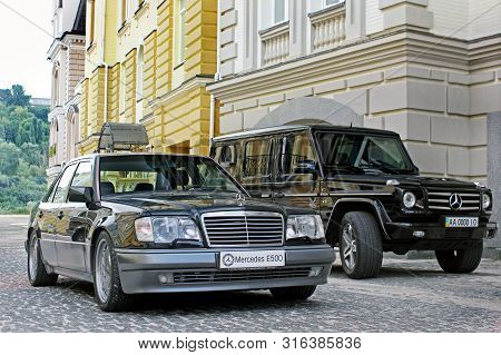Kiev, Ukraine - September 6, 2013: Mercedes E500 W124 Wolf On The Background Of Beautiful Old Houses