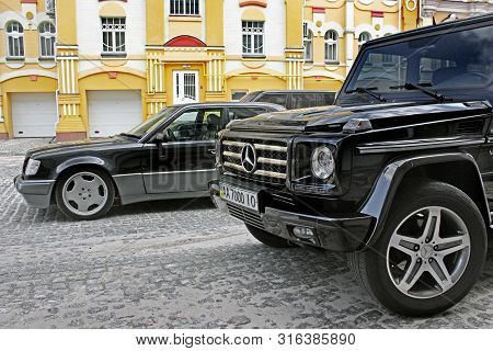 Kiev, Ukraine - September 6, 2013: Mercedes E500 W124 Wolf On The Background Of Beautiful Old Houses