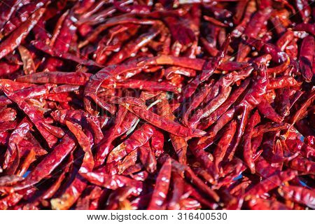 Dried Red Chilli, Food Ingredient. Red Dry Chilli Texture Background.