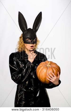 31 October. Surprised Young Woman In Halloween Bunny Costume. Sexy Girl In Bunny Mask With Jack O La