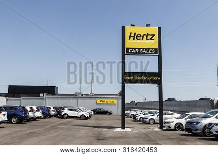Indianapolis - Circa August 2019: Hertz Car Sales Dealership. Hertz Sells Used Vehicles From Their C