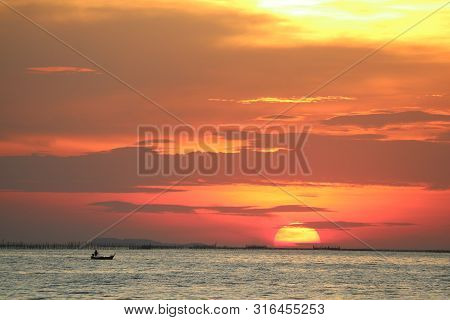 Sunset On Red Yellow Sky Back Evening Cloud Over Horizon Sea