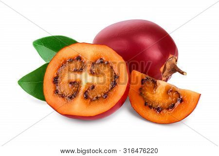 Fresh Tamarillo Fruit With Leaves Isolated On White Background