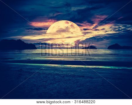 Super Moon. Colorful Sky With Bright Full Moon Over Seascape. Serenity Nature Background, Outdoor At