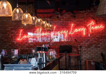 Singapore - July 8th 2019: Bar With Humorous Neon Sign. There Are Many Bars And Restaurants In Clark