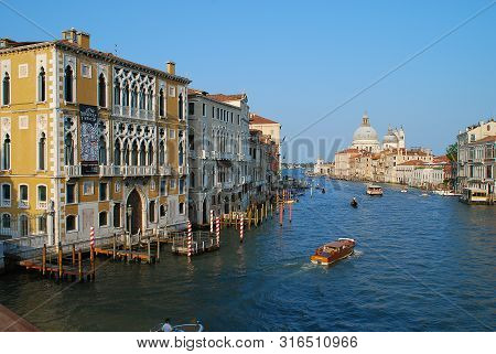 View Of Grand Canal In Venice, Italy, From The Academia Bridge, On The Left Side The Palazzo Cavalli