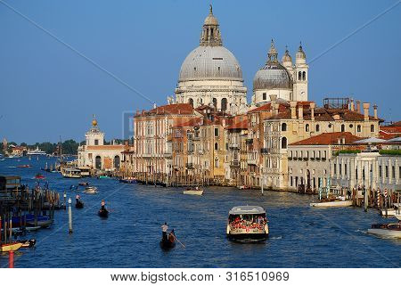 View Of Grand Canal In Venice, Italy, From The Academia Bridge: Basilica Di Santa Maria Della Salute