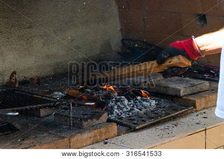 Fire In A Barbaque, Setting Fire On Coal Barbacue