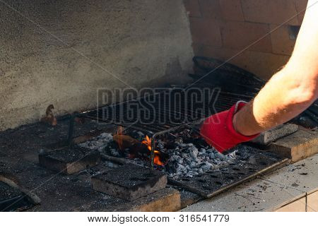 Fire In A Barbaque, Setting Fire On Coal Barbacue