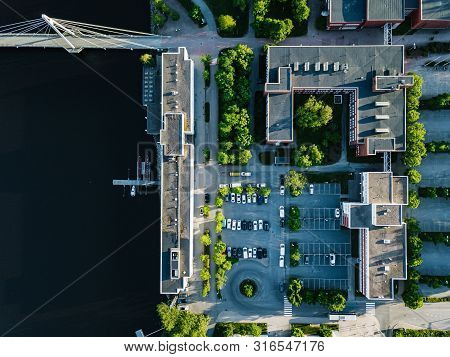 Aerial View Of City Buildings With Car Parking. University Of Jyvaskyla In Finland