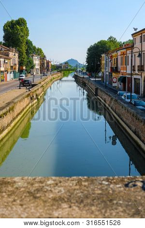 Battaglia Terme, Italy - July, 27, 2019: Landscape with the image of channel in Battaglia Terme, Italy