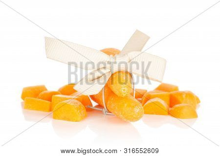 Group Of Two Whole Lot Of Halves Of Stale  Orange Stale Baby Carrot Baby With Bow Isolated On White 