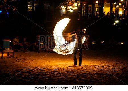 Circle Fireshow At Beach In The Koh Tao Island In Thailand