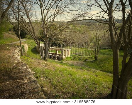 An Old Stone Wash-house Lost In The Countryside In South Of France
