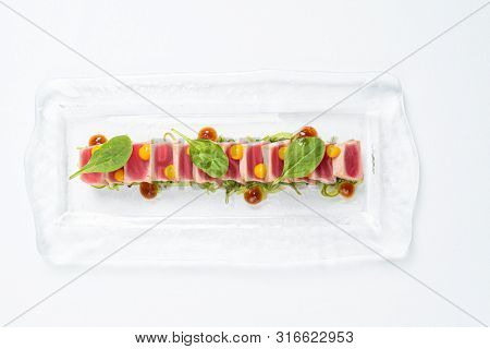 sliced steak fof tuna with sauce