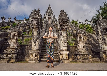 Young Man Tourist On Background Ofthree Stone Ladders In Beautiful Pura Lempuyang Luhur Temple. Summ